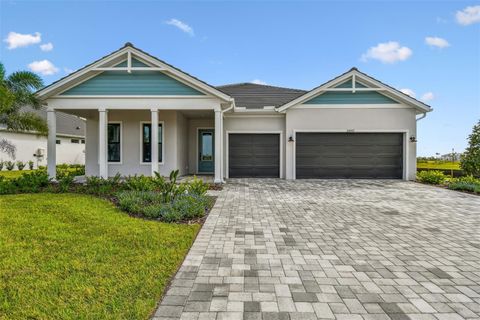 Photo of 18057 Foxtail Loop, Venice, FL 34293 (MLS # TB8366934)
