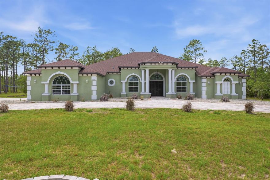 Step into this beautiful 4 bed 3 bath custom designed home where thoughtful upgrades and inviting spaces come together to create a truly comfortable living experience. A bright, open layout welcomes you with natural light, stylish finishes, and a seamless flow ideal for both everyday living and entertaining.

The heart of the home is the modern kitchen, featuring upgraded countertops, quality cabinetry, and a spacious island perfect for gatherings. The adjoining living and dining areas have warmth and versatility, making it easy to host or unwind.

The primary suite serves as a private retreat with a generous layout, walk-in closets, and a spa-inspired bathroom. Additional bedrooms provide comfort for guests, family, or a dedicated office or home gym.

Step outside to enjoy a beautiful outdoor space — whether it’s a covered patio or the expansive yard it is the perfect setting for relaxing evenings or weekend get-togethers.

The 3 car garage and expansive paver driveway adds functionality and character to the home.

The home is equipped with a whole home water filtration system that is chemical and maintenance free.

Located in a desirable area close to local conveniences, this home blends style and comfort.