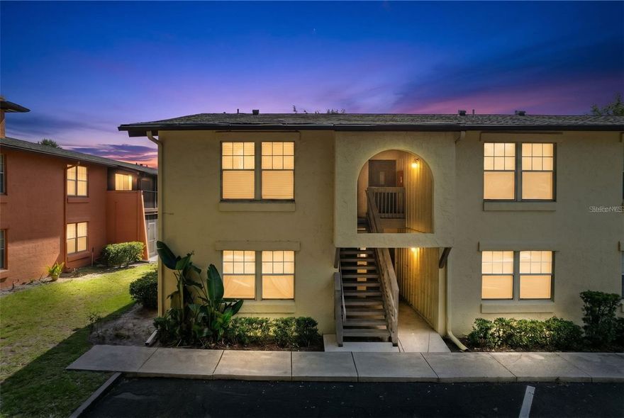 FULLY FURNISHED GROUND-FLOOR CORNER UNIT with a private backyard setting and lake access in the heart of SoDo district —offering a rare blend of convenience, comfort, and lifestyle.
This move-in-ready home stands out with its extra natural light, easy access, and added privacy as a corner unit. Inside, you’ll find a spacious living and dining area, a bright kitchen with stainless steel appliances, and a washer/dryer combo for everyday ease. Laminate and tile flooring run throughout—no carpet—paired with upgraded smart lighting for a clean, modern feel.
Storage is thoughtfully designed with double closets in the primary bedroom, a large foyer closet, and additional dining-area storage—making the space as functional as it is comfortable.
Step outside to one of the home’s most desirable features: a screened-in porch overlooking a quiet, private green space. It’s the perfect spot for morning coffee, evening relaxation, or simply enjoying the peaceful setting.
Located in a well-maintained, amenity-rich community, residents enjoy a true resort-style lifestyle with private dock access and a boat ramp on Lake Pineloch, two pools (including a lakefront pool), a fitness center, and clubhouse.
All of this just minutes from downtown Orlando, including Lake Eola, the Dr. Phillips Center, and major hospitals—approximately 5 minutes to ORMC and 8 minutes to AdventHealth Orlando—making it an excellent option for primary residents, seasonal use, or investment potential.
Low-maintenance living in one of Orlando’s most convenient locations—schedule your private showing today.