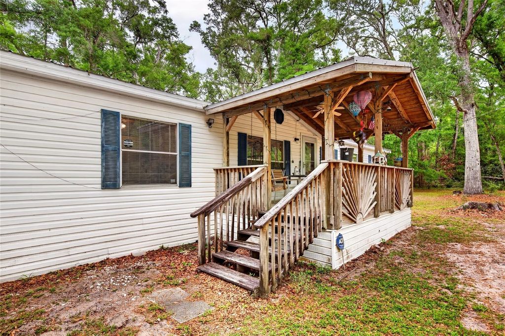 Photo of 1502 NE 644th Street, Old Town, FL 32680 (MLS # OM722511)