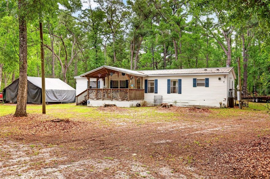 Situated on 2.1 private acres, this 3-bedroom, 2-bathroom home offers the space, privacy, and flexibility that today’s buyers are searching for. Surrounded by mature trees and natural scenery, this property delivers a quiet, peaceful setting while still providing the functionality of a well-designed home. Inside, you’ll find a versatile layout with dual living areas, giving you the freedom to create separate spaces for relaxing, entertaining, working from home, or accommodating guests. The kitchen flows seamlessly into the main living areas, making everyday living comfortable and connected. The primary suite is generously sized and features a walk-in shower along with a spacious bathroom layout. One of the standout features of this property is the screened-in porch—an ideal place to unwind, enjoy the fresh air, and take in the privacy of your land without the hassle of bugs or weather. With 2.1 acres, there is plenty of room to expand, bring your toys, create outdoor living spaces, or simply enjoy the freedom that comes with owning your own land. This home is also equipped with key updates for peace of mind, including a new metal roof (2023), central HVAC (2018), newer water heater, newer well pump, and a water softener system. Washer and dryer are included for added convenience. The property truly shines when it comes to functionality, featuring a large powered exterior shed built in 2023 with two separate spaces, along with an additional 12x24 shed—perfect for storage, workshop use, or hobbies. If you’re looking for privacy, usable acreage, and a home that offers both comfort and flexibility, this property checks all the boxes. FREE APPRAISAL WITH IN-HOUSE LENDER