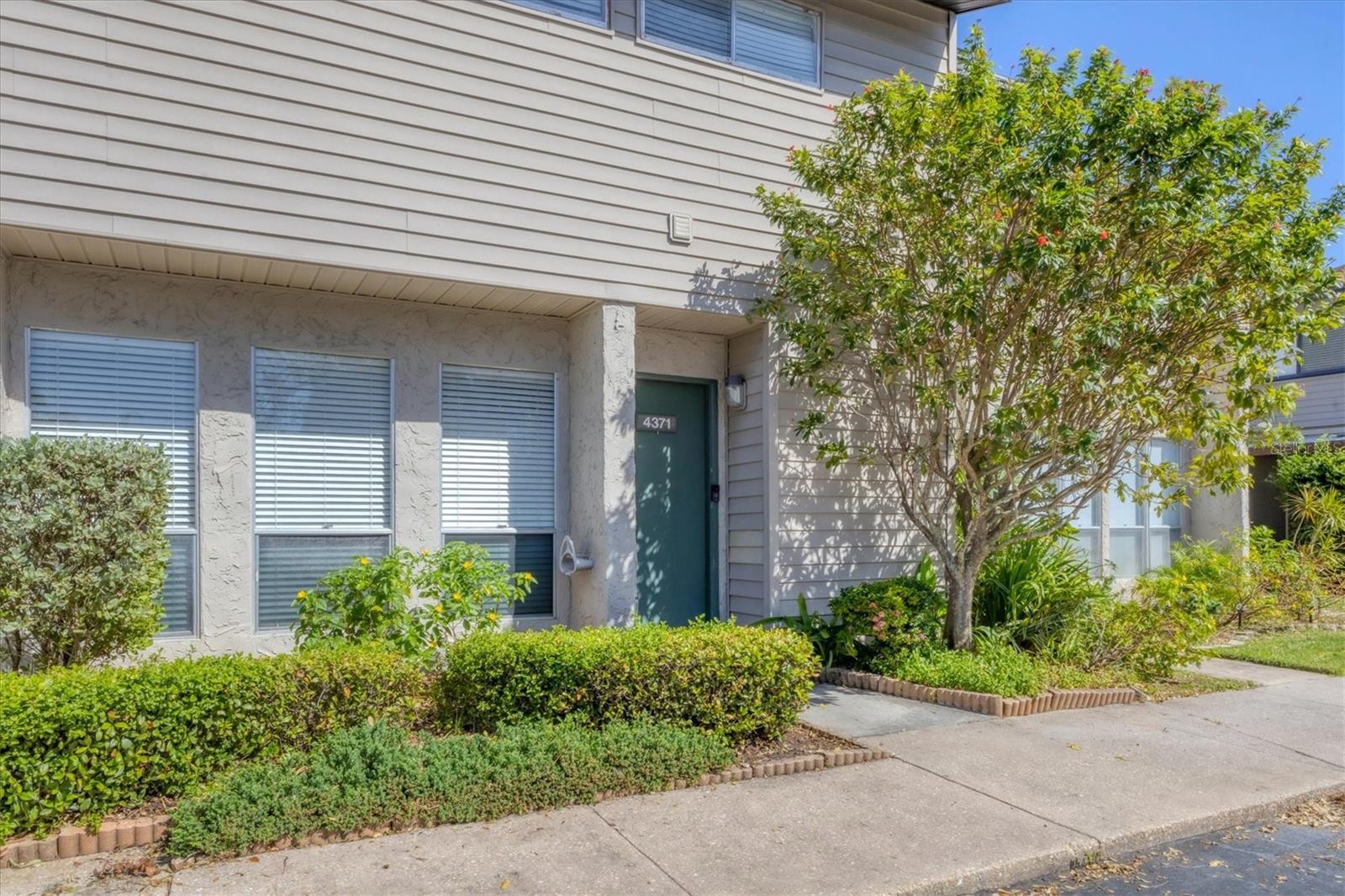 BACK ON THE MARKET!!! Welcome to the cozy and charming maintenance free living community of Hidden Hollow! As you walk thru the front door you are welcomed with a fresh new look. The seller has painted the interior doors, frames and shelves. The extra touches included all new hardware and doorknobs! This middle unit offers a large living room with views of mature landscaping. Unit comes complete with an upstairs master suite to include an en-suite bath, walk-in closet and bonus area for an office or workout space. The guest room also has a recently updated en-suite. There is a half bathroom located downstairs for you and your guest's convenience. Low HOA fees include trash, exterior maintenance, pest control, and sewer. This unit's upgrades also include roof done in 2023, ac in 2018 and ductwork in 2013. The community offers a gorgeous screened in pool, outdoor pool shower, clubhouse that has a full kitchen and bar, tennis court, and pickleball court. Hidden Hollow is located conveniently near downtown Sarasota, Sarasota Airport, St Armand's Circle, UTC Mall, Benderson Park, & Lakewood Ranch with plenty of restaurants and entertainment.