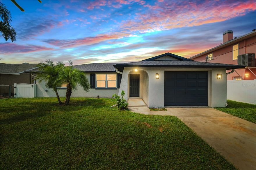 Completely renovated waterfront beauty with direct Gulf access! This stunning home has been fully transformed from top to bottom. There's
nothing left to do but move in and enjoy! Step inside to discover brand-new hurricane-impact windows and doors, a new roof, and a two-year-old HVAC system for year-round comfort. Fresh insulation meets current energy codes, ensuring efficiency and peace of mind. Every inch shines with new flooring throughout, fresh interior and exterior paint, upgraded trim, and new interior doors. The gourmet kitchen is a chef's dream, featuring premium finishes and modern cabinetry. The newly renovated baths showcase stylish tile, updated fixtures, and contemporary vanities. The electrical system has been upgraded to current code, complete with new lighting throughout. A new tankless water heater rounds out the impressive list of upgrades. Out back, relax on the spacious lanai while enjoying serene water views. The deep-water canal offers direct access to The Gulf! Perfect for boaters and water sports enthusiasts alike.