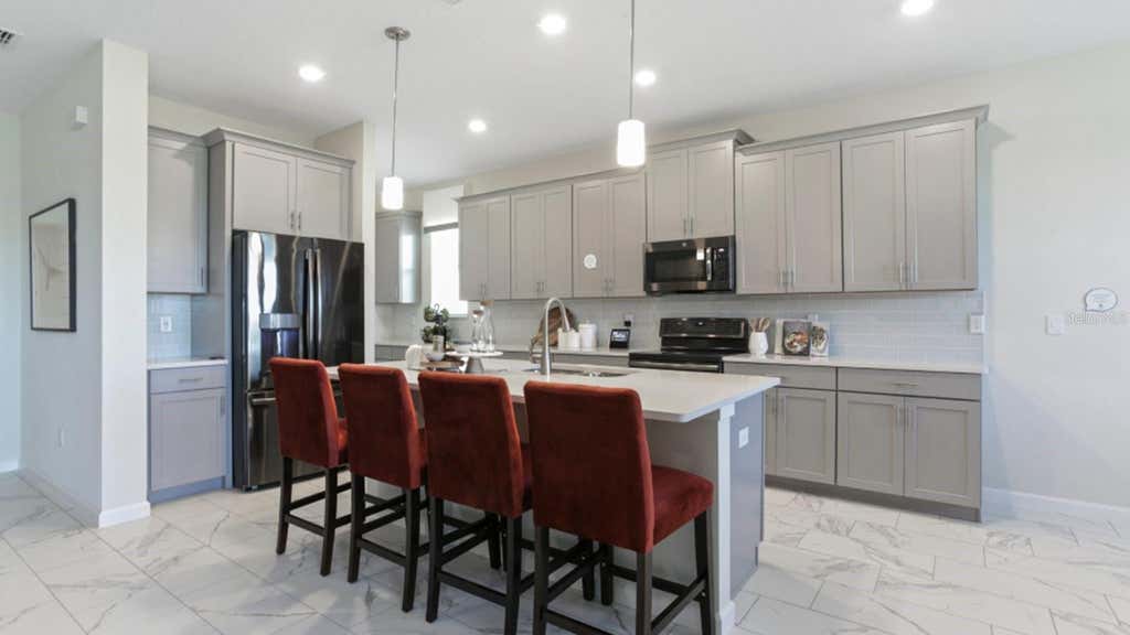Photo of 3156 Namaste Drive, Clermont, FL 34714 (MLS # O6434555)
