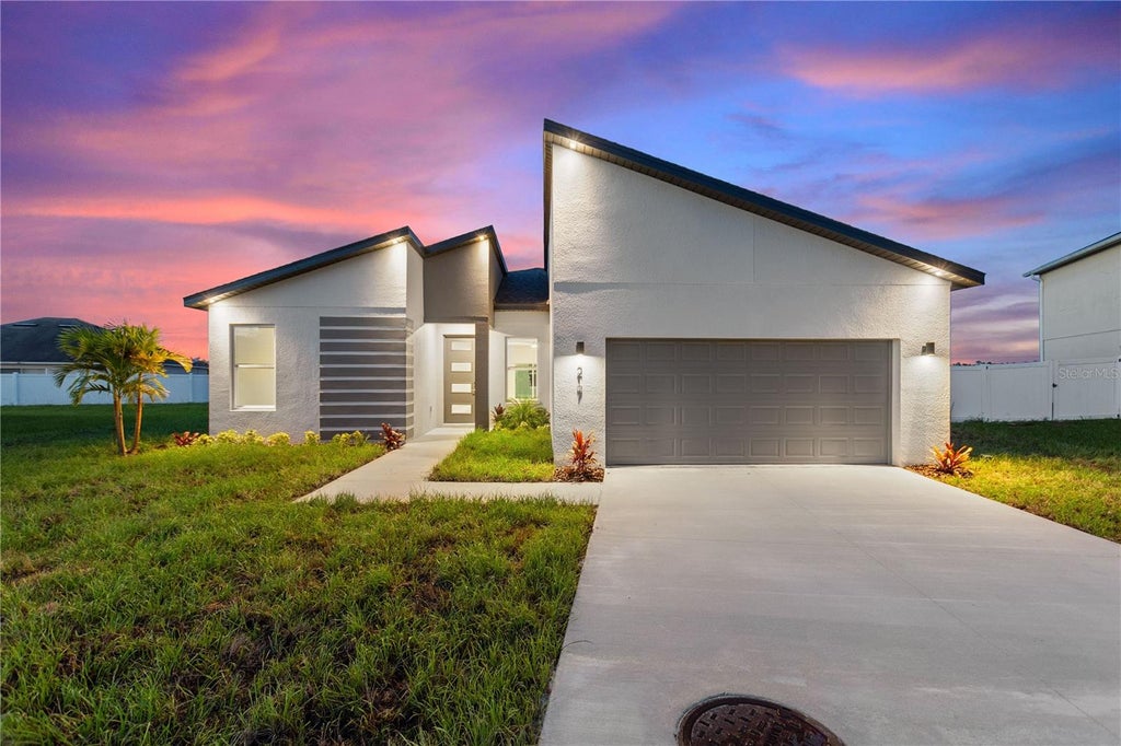 Photo of 217 Cimarron Drive, Poinciana, FL 34759 (MLS # O6441673)