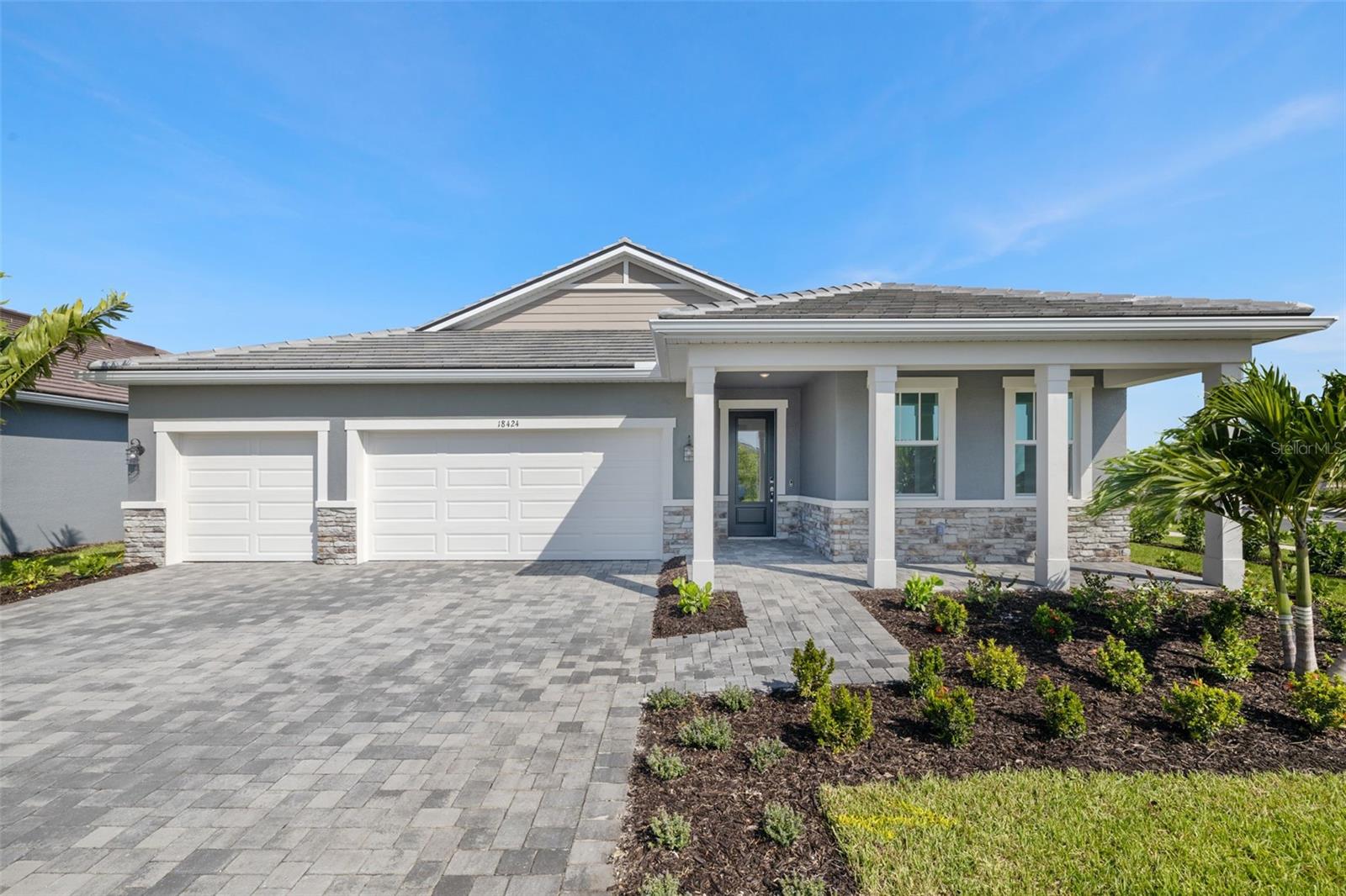 Under Construction. Welcome to the Isle Royal, a luxurious home situated in the gated community of Lakeside in Wellen Park, Venice, Florida. This stunning property offers 2,867 square feet of meticulously designed living space, featuring 4 bedrooms, 3.5 bathrooms, a retreat, and a 3-car garage. Upon entering, you will be captivated by the open floor plan and the elegant design. The main living areas are adorned with wood-inspired tile flooring, providing a warm and stylish ambiance. The executive kitchen is a chef's dream, showcasing 42" upper cabinets painted Linen and pristine quartz countertops, perfect for culinary creations and entertaining. With two walls of cabinetry and an oversized walk-in pantry, there is excessive space for all the kitchen accessories. With the kitchen looking directly out over the dining and Great Room, this home utilizes every last square foot of usable space. You get a view of the extended lanai through the glass sliders and two sets of windos. The master suite is a private oasis, featuring a spacious bedroom and an en-suite bathroom with separate vanities and a glass enclosed shower. The suite also boasts two walk-in closets. The additional bedrooms are generously sized, ensuring comfort and privacy. Bedroom 2 is on a hallway off the foyer and includes a en suite full bath. Bedrooms three and four or accessible from the foyer on the opposite side and is divided by a retreat area and a full bath. There is a powder room, just before the kitchen for added convenience and privacy of the full baths. Outdoor living is truly exceptional with the large, covered and screened lanai, equipped with two sets of sliding glass doors that seamlessly blend indoor and outdoor spaces. This area is perfect for entertaining or simply relaxing while enjoying the beautiful Florida weather. Residents have convenient access to schools, scenic parks, and a variety of shopping and dining options. The community's proximity to Tampa and Sarasota ensures you are never far from urban amenities and entertainment. Ready to move in February/March 2025. Photos, renderings and plans are for illustrative purposes only and should never be relied upon and may vary from the actual home. Pricing, dimensions and features can change at any time without notice or obligation. The photos are from a furnished model home and not the home offered for sale. The pictures of the amenities are from the sister property, Sunstone at Wellen Park and will be accessible to residents of Lakeside. Lakeside will also have it's own amenities area.