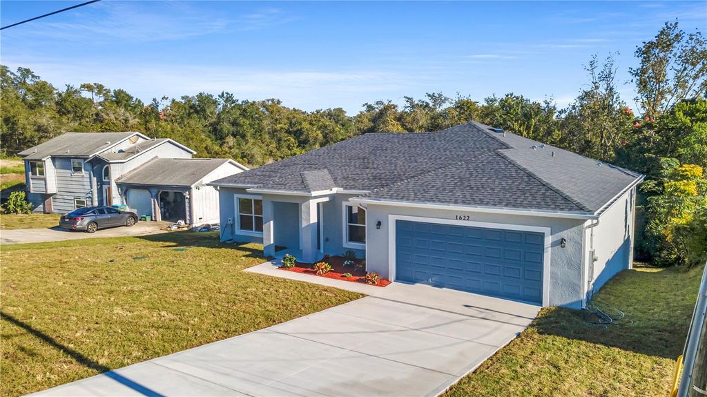 Photo of 1622 N Merrick Drive, Deltona, FL 32725 (MLS # V4945900)