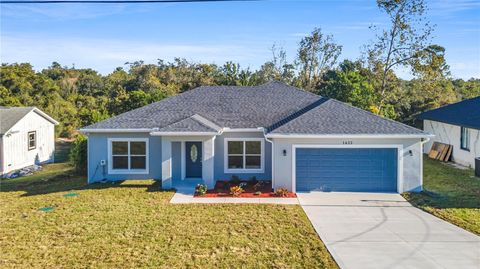 Photo of 1622 N Merrick Drive, Deltona, FL 32725 (MLS # V4945900)