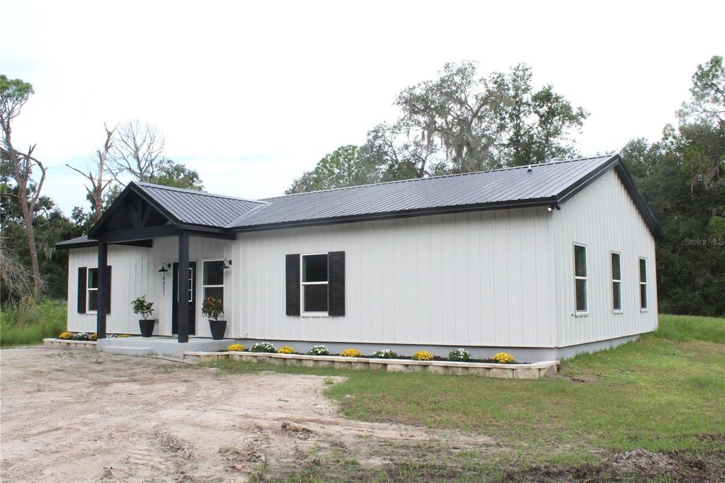 Photo of 14451 Manatee Road, Parrish, FL 34219 (MLS # A4664971)