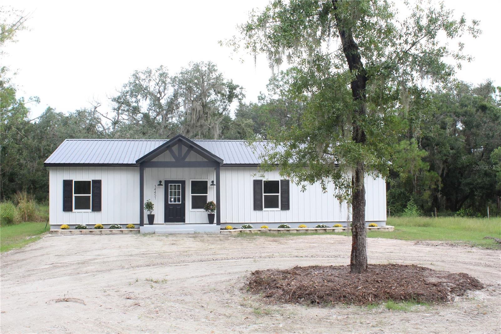 Welcome home to this Brand New House located on a large private lot! Looking for a quality built home on a private lot with no deed restrictions? Then look no further! This lovely 4 bedroom and 3 bath home is perfect! Builder has put Luxury Vinyl throughout the home which gives it that warm country look. You'll love the large island kitchen with white shaker style cabinets, granite tops, and Stainless Steel Samsung appliances. The owners suite has two walk in closets, a large, tiled shower, and dual sinks. Two bedrooms have a full Jack and Jill bathroom and the third bedroom/office has its own closet and full bathroom as well. The builder has included a transfer switch for a generator. This lot will permit a second building on the property up to 70% of the homes size. So you can have that barn or garage you always wanted or build a seperate in-law suite, theres endless possibilities. If you're looking for a quiet peaceful setting for your next home, you found it!