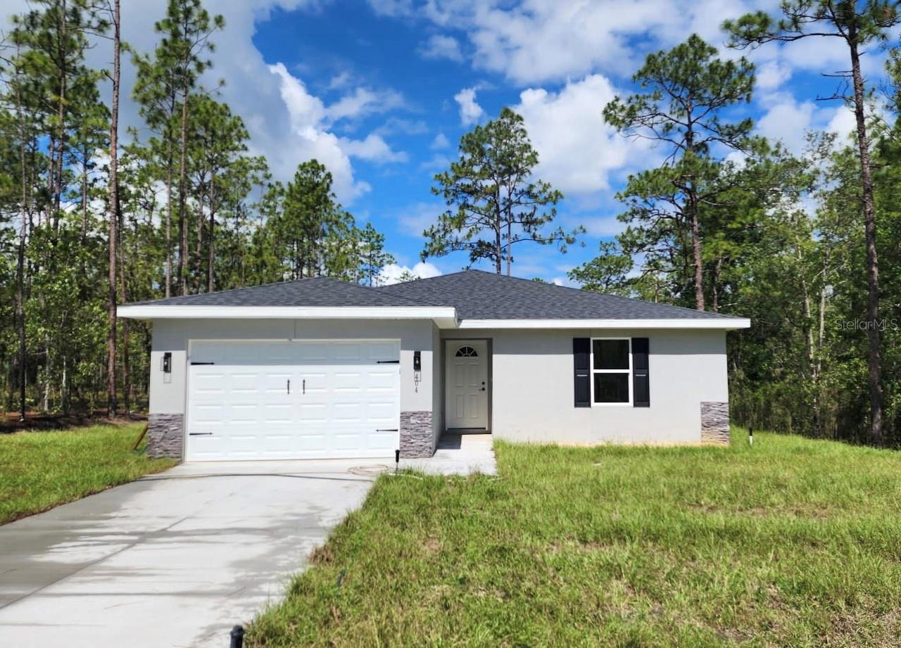 New Construction 3 bedroom 2 bath Home Located in the up and coming neighborhood of Rainbow Lakes Estates just 30 minutes west of Ocala, 15 minutes from Downtown Dunnellon, and 30 minutes from the Gulf Coast town of Crystal River. This home's upgrades include Stainless Steel Appliances, All Wood Cabinets with soft close hinges, Granite Countertops in Kitchen and Baths, Tile Shower and bathtub wall, Luxury Vinyl Plank Flooring throughout, and one and a half car garage with garage door opener. Builder provides 1 year Workmanship, 2 year Systems Warranty and 10 year Structural Warranty thru the Nations Largest 3rd Party Home Warranty Provider HBW 2-10. Love the Community you live in! Rainbow Lakes Estates offers a Community Center and a Recreational Park which include playgrounds, tennis courts, racquetball courts, basketball courts, baseball field, walking trails, a boat ramp to Tiger Lake, and picnic pavilions. Rainbow River and Rainbow Springs are part of Marion County's Top outdoor attractions and are only a short 10 minute drive from Rainbow Lakes Estates. Enjoy the crystal clear water for kayaking, tubing and outdoor fun. Play a round of golf just 10 minutes away at Nationally recognized Juliette Falls Championship Golf Course. Whether you enjoy outdoor activities and adventure, or prefer to relax and enjoy the beauty of nature, you'll love calling Rainbow Lakes Estates your home.