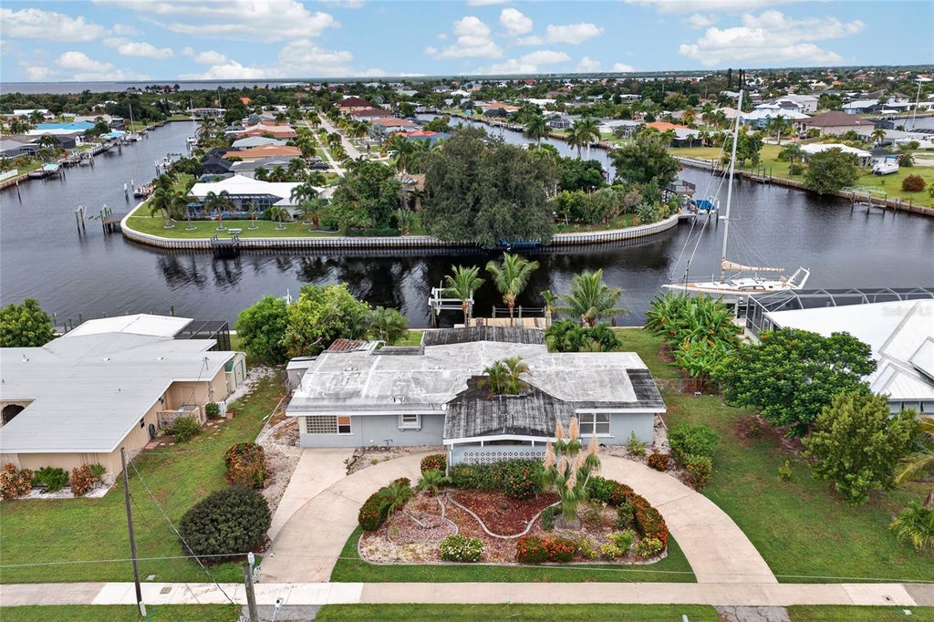 Photo of 182 Beeney Road SE, Port Charlotte, FL 33952 (MLS # C7531293)