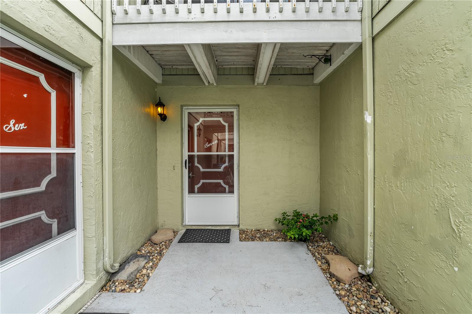 BOUGAINVILLA CONDO Complex only has 10 units. located in the heart of Orlando, FL 32803. If walking distance to Mills 50 and Lake Ivanhoe nightlife and restaurants were not appealing enough, this unit has undergone some major updates in the last few years. New HVAC system, electrical panel, re-plumbed, water heater, updated insulation, and smart home features! This thoughtfully designed property offers a comfortable and convenient lifestyle. This condominium features 2 bedrooms, 1 full bath, and 1 half bath, providing ample space for comfortable living. The well-equipped kitchen includes a dishwasher, range, new microwave, newer refrigerator, water filtration system under the kitchen sink and solid surface counters. As you step inside, you'll be greeted by the inviting living room/dining room combo, in the living room, you also have a wood-burning fireplace, creating a versatile space for relaxation and entertaining guests. The interior features include ceiling fans for optimal climate control, both bedrooms are upstairs, there is a murphy bed in the 2nd bedroom that can stay for new owners. Parking is a breeze, with assigned parking, common parking areas, and guest parking available. On-street parking provides additional convenience for residents and guests alike. One of the standout features of this property is the community pool, which offers a perfect retreat for relaxation and recreation. Whether you want to take a refreshing dip or simply soak up the sun by the poolside, this amenity adds to the overall appeal of the condominium. Situated in a prime location surrounded by the vibrant energy of Orlando, with easy access to local amenities, dining, and entertainment options, as well as the Orlando Urban Trail, a walking and bicycle path. This condominium presents an excellent opportunity for those seeking a stylish and well-appointed home in a desirable community.
