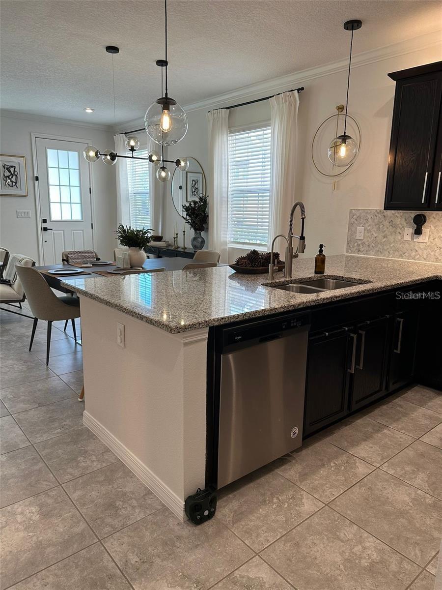 Photo of 2433 Varenna Loop, Kissimmee, FL 34741 (MLS # O6450431)