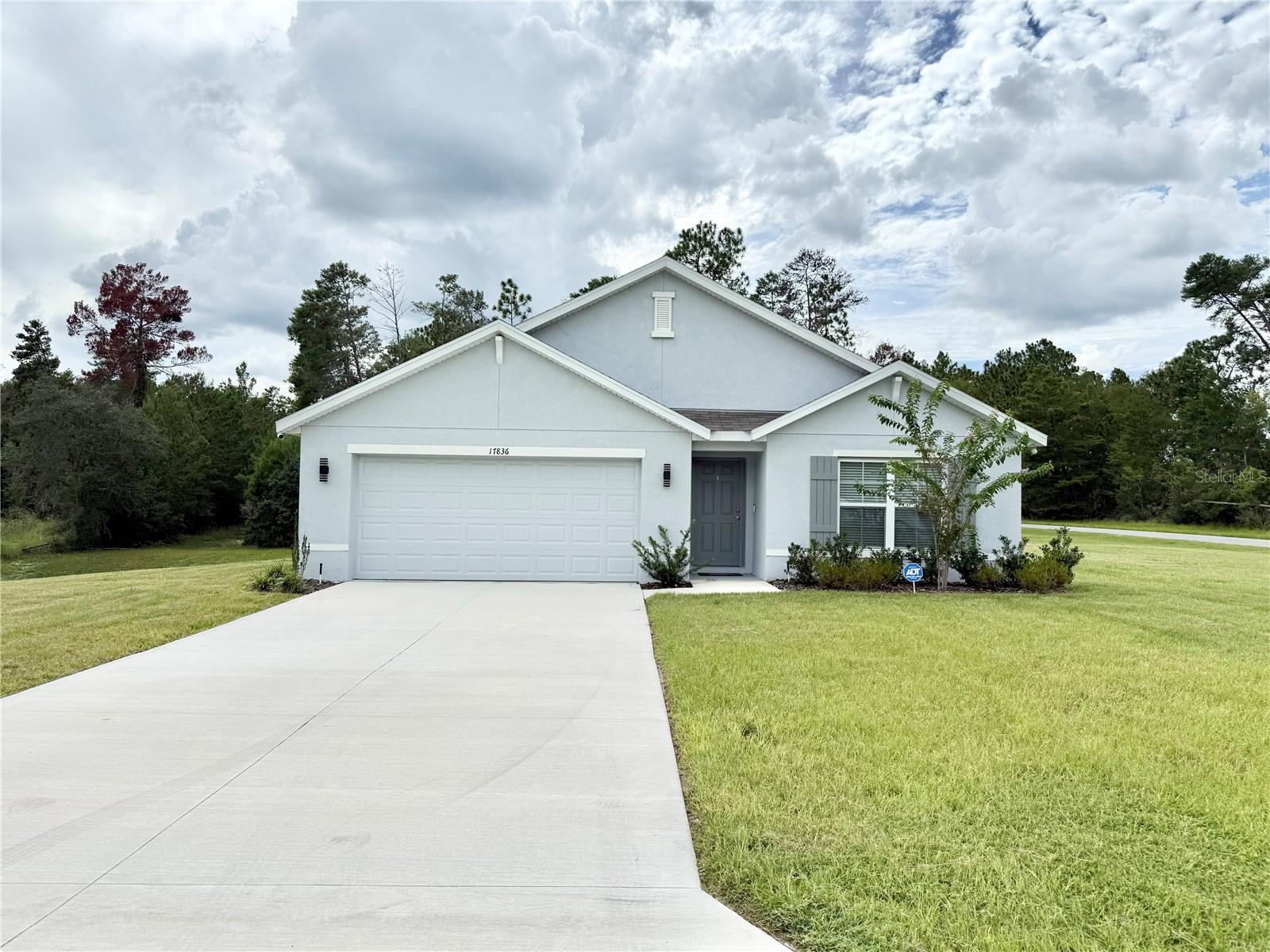 Spacious 4-bedroom, 2-bathroom home situated on a .51-acre corner lot with no HOA! This property features tile flooring throughout (Plush Carpet in Bedrooms), open layout that provides plenty of natural light. The kitchen and bathrooms offer elegant Quartz countertops, wood cabinets, and all appliances included, plus a washer and dryer for added convenience. Enjoy the large lot with plenty of outdoor space and flexibility. Don’t miss the opportunity to lease this beautiful move-in-ready home!