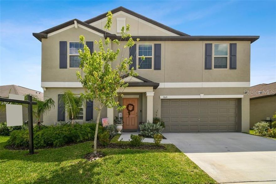 FOR SALE — TURN-KEY BEAUTY IN SUN CITY CENTER! Seller is offering $5,000 toward closing costs! Welcome to this stunning and spacious home located just off I-75 in the desirable Cypress Mills community, featuring a versatile flex room perfect for a home office or dining space, an impressive open-concept layout with a modern kitchen offering stainless steel appliances, ample storage, a large island, and seamless flow into the dining and living areas that lead to a backyard enhanced with brand-new pavers and a new fence installed in July 2025, creating the perfect private outdoor oasis. The oversized first-floor primary suite includes a double vanity, walk-in shower, linen storage, water closet, and a huge walk-in closet, while upstairs you’ll find a generous loft ideal for a game room or additional living area, along with four spacious bedrooms and a full bathroom with double sinks and a bathtub. This home is equipped with PAID solar panels and a Tesla Powerwall, which not only slashes electricity costs during sunny Florida months but also provides reliable power during outages—making this home hurricane-ready and exceptionally resilient. Located in a vibrant community offering a resort-style pool, tennis courts, and more, this turn-key home truly has everything you’re looking for—don’t miss your chance to make it yours!