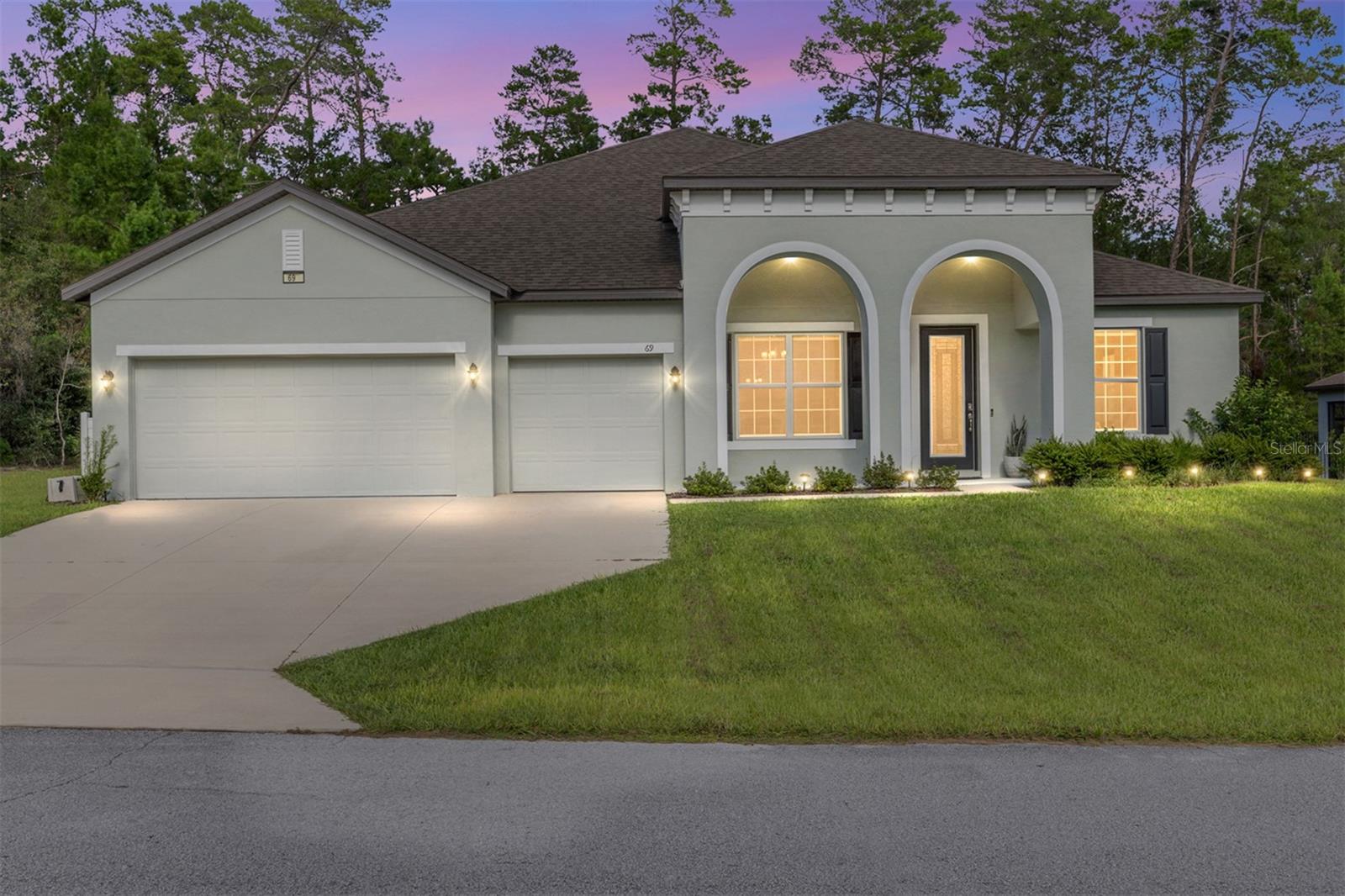 One or more photo(s) has been virtually staged. Welcome to your Florida dream home nestled on a large private lot in the serene Oak Village of Sugarmill Woods. This spacious 2022, 4/3 PLUS OFFICE, 3,060 sq ft residence offers the perfect blend of comfort, style, and functionality.
KEY FEATURES:
• BEDROOMS AND BATHS: Four generously sized bedrooms, each with a walk-in closet, and three full bathrooms provide ample space for family and guests. One bedroom and bath is separated giving privacy for guests, teens or as an IN-LAW SUITE.
• GOURMET KITCHEN: The heart of the home boasts gleaming granite countertops, abundant cabinetry, oversized island, smart stainless-steel appliances, double ovens, and a breakfast area ideal for casual meals, yet large enough for entertaining.
• LIVING SPACES: Enjoy a formal dining room for entertaining, an elegant, dedicated office for remote work or study, and an expansive living area filled with natural light.
• OUTDOOR LIVING: Step out through the pocket sliding glass doors to the covered back lanai—perfect for relaxing, grilling, or enjoying Florida’s year-round sunshine.
• ADDITIONAL HIGHLIGHTS: Three-car garage, large laundry room with built-in cabinets, storage closet and sink. High, tray ceilings throughout, crown molding, elegant finishes, and a thoughtful layout that balances open-concept living with private retreats.
Located in the desirable Sugarmill Woods community, you'll enjoy quiet streets, lush greenery, and access to golf courses, nature trails, and the Gulf Coast just minutes away. You can have all this and still be a short drive to Tampa! This home combines style, functionality, and peaceful convenience. Book your tour now!
