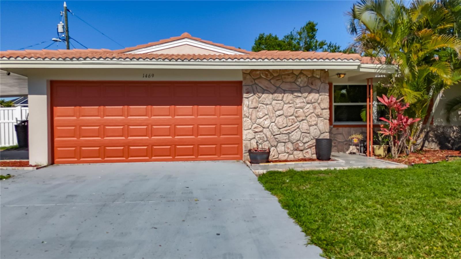 This stunning 3-bedroom, 2-bath home has been transformed from top to bottom and is ready for you to move right in The moment you step inside, youll be wowed by the wide-open layout, brand-new luxury vinyl flooring throughout, and a designer kitchen that shines with quartz countertops, sleek new cabinets, modern sink, and updated fixtures. Both bathrooms have been beautifully renovated, with the primary suite featuring a spa-like walk-in shower and fresh, modern finishes. The updates dont stop therethis home also offers new windows in every room, fresh interior and exterior paint, and a brand-new fence for added privacy. The Spanish tile roof was installed just 10 years ago and still looks fantastic. ROOF INSTALLED IN 2014 SPANISH TILE ROOF.NEW A/C CHANGED IN 2021 GOOD CONDITION Sitting on an oversized corner lot, youll love the spacious backyard and custom-built storage shedbig enough for all your tools, toys, or even a workshop. Parking is a dream with a 2-car garage, 2-car carport, and room for four more in the driveway. All of this just 2 miles from world-famous Clearwater Beach, with easy access to shopping, dining, and everything the Gulf Coast lifestyle has to bring. Homes this updated in this location dont last longschedule your showing today and make it yours before someone else does! Application Link: https://apply.link/GmWM3Mw
