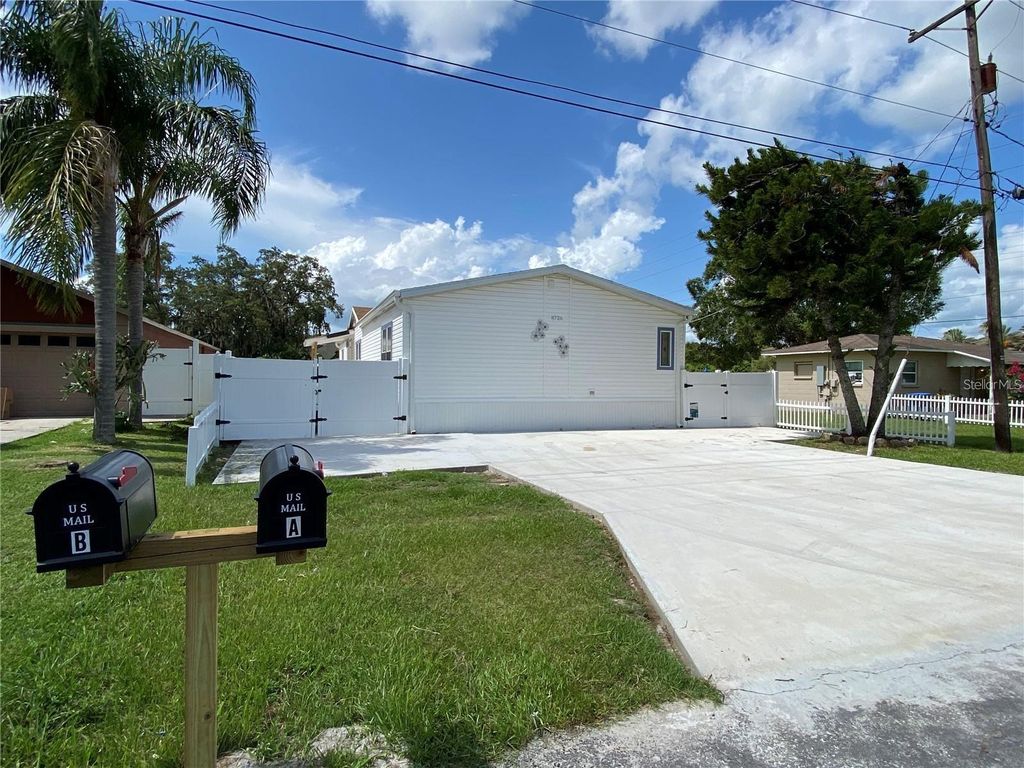 Photo of 8726 Mayflower Road, Tampa, FL 33615 (MLS # TB8416774)