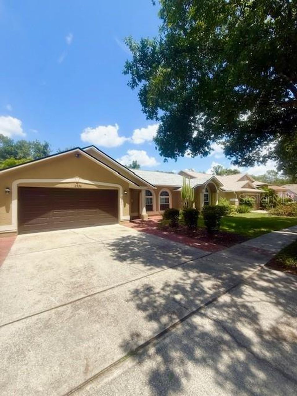 Photo of 10936 Dearden Circle, Orlando, FL 32817 (MLS # O6377315)