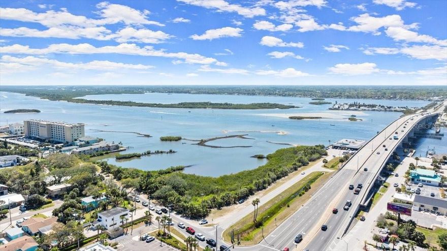 Waterfront 2.5-acre commercial lot at the base of the Dunlawton Bridge in Port Orange, FL with direct Intracoastal access and high visibility. Zoned Community Commercial (CC)—ideal for restaurants, breweries, retail, or service uses. Special permitted uses include marinas and boat storage, perfectly suited to the property’s Halifax River frontage. Prime location near restaurants, marina, public boat launch, beaches, and the Riverwalk District, a developing waterfront hub blending commercial, residential, and recreational spaces. Exceptional development opportunity in a growing, high-traffic area.