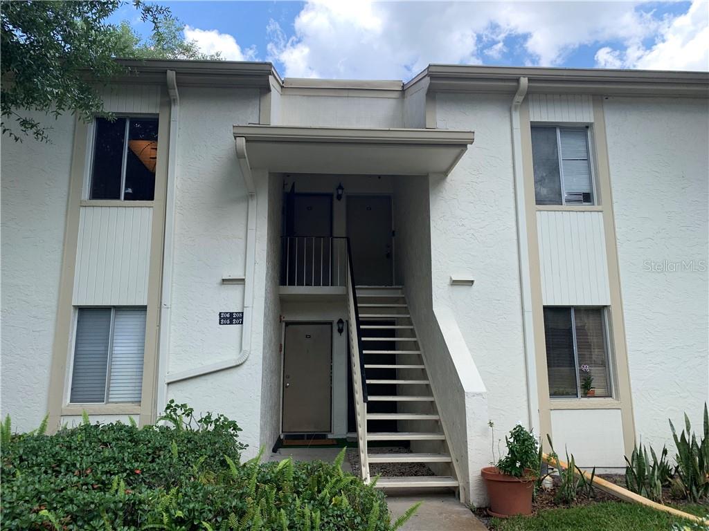 This is the perfect East Lake Woodlands condo with 2BR/2BA/1 Carport, 982 sqft, 2nd floor unit. The kitchen features beautiful storage, a lazy susan, and all appliances. Tile flooring throughout the entire condo. Great bathrooms. The interior was just painted. There are two sets of sliding doors to access the lanai. The living room and the Master Bedroom open to a screened Lanai. The Master bedroom features 2 walk-in closets and a private bath with a shower. There is a storage room with laundry hookups, and the unit comes with a washer and dryer! Your covered parking space is right at the base of the stairs to the unit. Guest parking is ample, a rare commodity with some condos. This gated community is bordered by the 8,700-acre Brooker Creek Preserve. East Lake Woodlands is a great location to commute to Tampa, Clearwater, St Pete, Tampa International Airport (25 minutes away), and beaches (10 minutes away). Minutes away from Restaurants, Shops, and a Movie theater, medical facilities. Rear entrance provides access to shopping and dining on East Lake Rd and Tampa Rd (even walking distance). Memberships are available with the East Lake Woodlands Country Club, which offers two golf courses, tennis, dining, a pool, and a recreation building with a fitness center. This is a smaller, pet-friendly, all-ages community. Monthly fee includes the community pool, exterior building maintenance, roof, basic cable, trash, water, sewer, grounds maintenance, and building insurance.