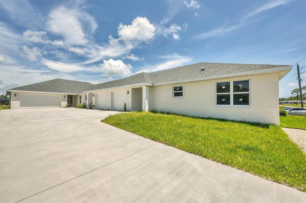 Photo of 236 Boundary Boulevard, Rotonda West, FL 33947 (MLS # D6142984)