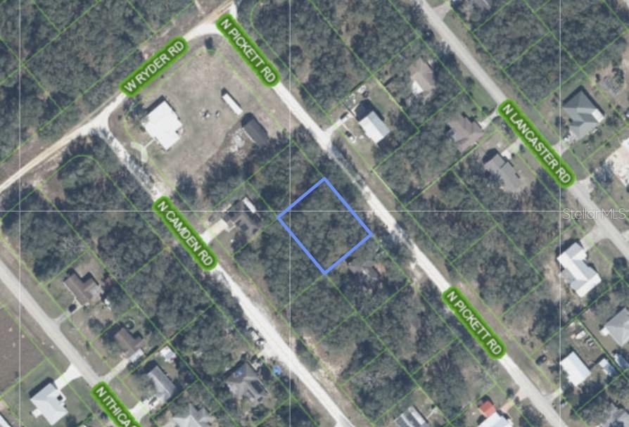 Vacant, wooded lot less than a block from Lake Olivia in the Avon Park Lakes neighborhood.
