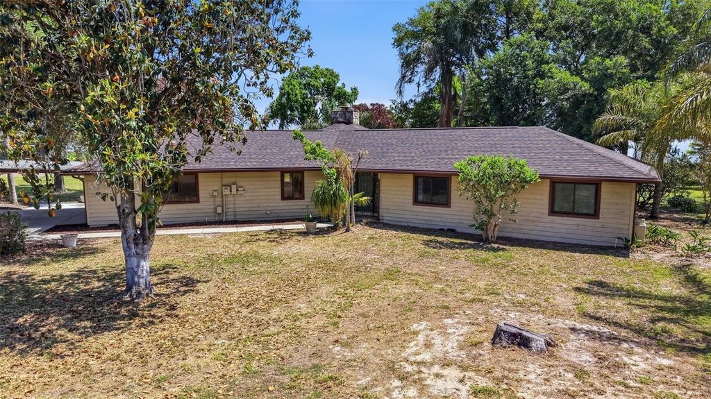 Photo of 410 S Ramona Avenue, Lake Alfred, FL 33850 (MLS # L4961294)