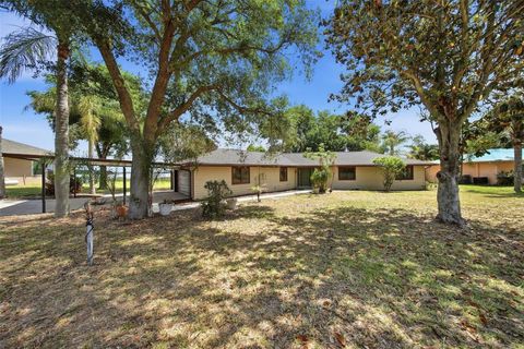 Photo of 410 S Ramona Avenue, Lake Alfred, FL 33850 (MLS # L4961294)