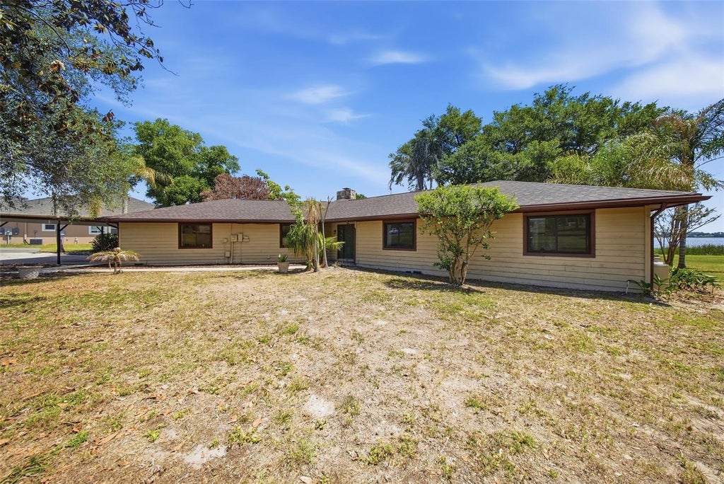 Photo of 410 S Ramona Avenue, Lake Alfred, FL 33850 (MLS # L4961294)