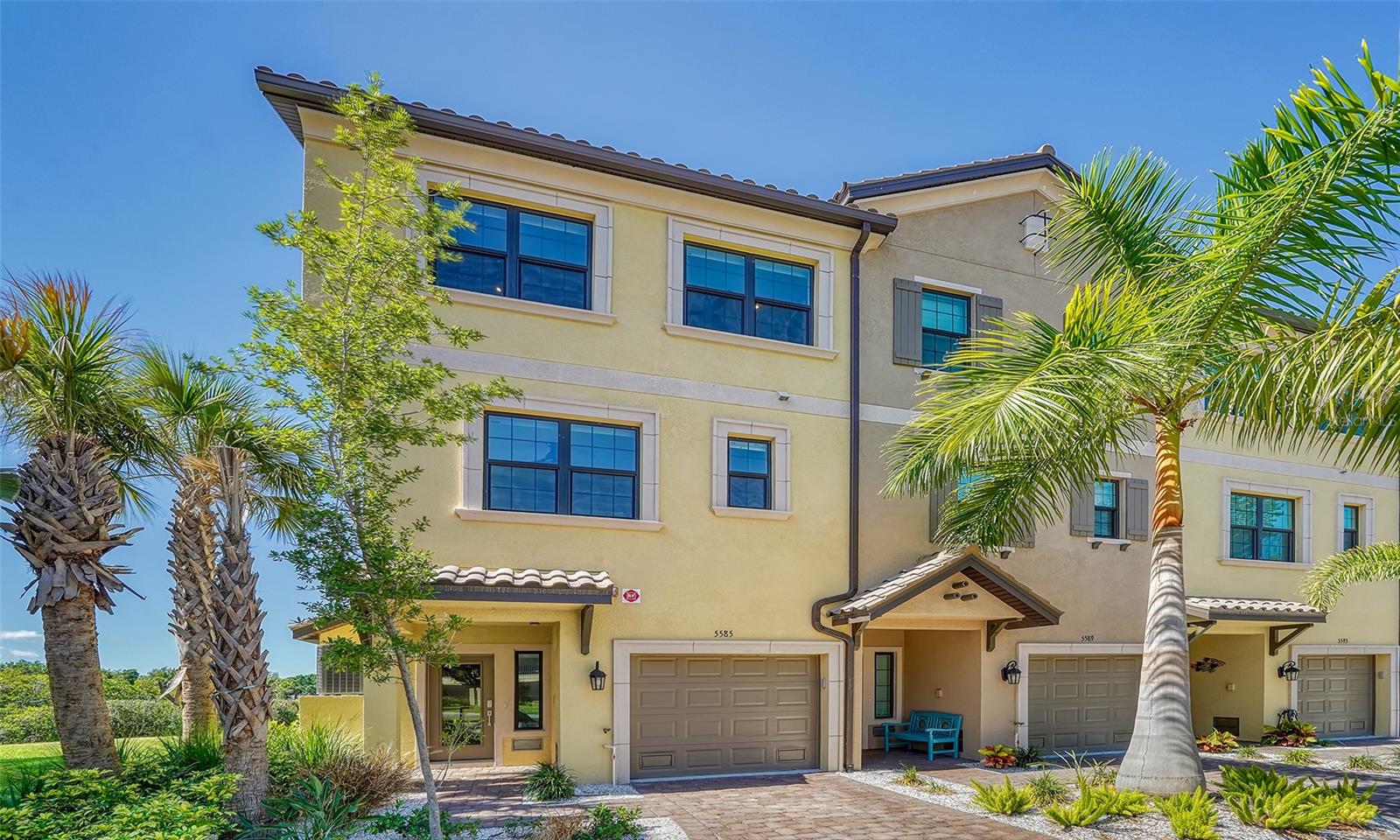 Impeccable in style, this 3-story townhouse has 3 bedrooms and 3 full baths. The stunning kitchen has GE cafe appliances including an induction cooktop, quartz countertops, and stainless steel appliances. 10' ceilings, a private elevator and a view of the water add to the incredible ambiance! This home is built to the latest hurricane codes with impact windows. This gated community is a short distance to Siesta Key beach, downtown Sarasota and Venice and offers a heated pool, fitness center and clubhouse. You have a beautiful water view from your screened balcony for your enjoyment and relaxation. FURNISHED and READY FOR OCCUPANCY!