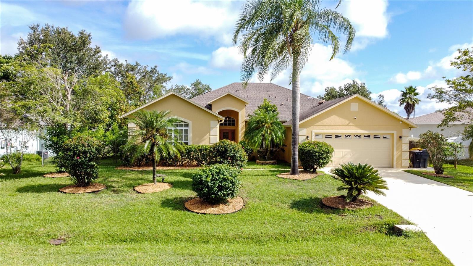 Florida Living at Its Best – Sparkling Pool, Smart Upgrades & Over ¼ Acre! Move-In Ready 4-Bedroom Beauty with Screened Pool & Lush Fruit Trees! Updated, Upgraded & Perfectly Located – Your Poinciana Dream Home Awaits! Welcome to 503 Gull Drive, a stunning 4-bedroom, 3-bath pool home in the Villages of Poinciana that offers the perfect combination of style, comfort, and location. This spacious one-story block residence has been freshly painted inside and out in 2025 and features engineered wood flooring throughout with ceramic tile in all wet areas. The kitchen is a chef’s delight with beautiful wood cabinets, granite countertops, and a complete stainless steel appliance package. The laundry room is equipped with shelves, a laundry tub, and a washer and dryer. The living and dining rooms are perfect for entertaining, while the family room provides a cozy retreat. The primary suite boasts an oversized walk-in closet, a garden tub, and a separate shower for a true private escape. Step outside to your expansive screened-in patio overlooking the sparkling in-ground pool—perfect for outdoor gatherings, fun, and relaxation. Set on over a quarter-acre, the fenced backyard is beautifully landscaped with mature fruit trees, offering shade, privacy, and charm, creating a serene and peaceful environment. Additional highlights include a two-car garage, roof replaced in 2017, new A/C and hot water heater in 2024, and 2025 roof and termite certifications. Smart upgrades add convenience and peace of mind with an ADT alarm system, Nest WiFi thermostat, new pool filter, and WiFi-enabled garage door opener with battery backup. Located in a prime location just minutes from top-rated schools, shopping, and dining, this home is part of a vibrant community that truly has it all. Poinciana offers a regional hospital, Valencia College campus, multiple parks, pools, gyms, and a variety of recreational options—swim in the Olympic-size pool, stroll along scenic walking trails, or visit the dog park or the various sports courts and fields. With easy access to the SunRail and major highways, all of Central Florida’s world-famous attractions are within easy reach. This home checks every box—updated, upgraded, and move-in ready—in a growing community where you can live, work, and play. Schedule your private tour today and make this Florida dream home yours!