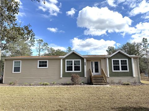 Photo of 8261 NE 118th Terrace, Bronson, FL 32621 (MLS # OM716296)