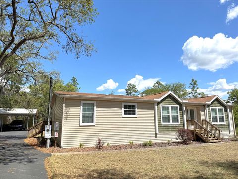 Photo of 8261 NE 118th Terrace, Bronson, FL 32621 (MLS # OM716296)