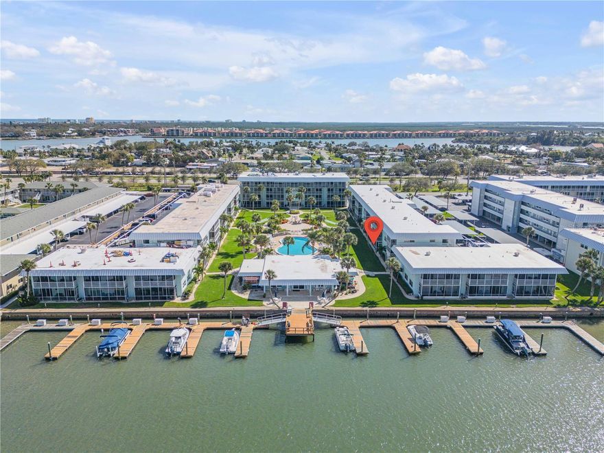 Investor-friendly coastal lifestyle condo in one of New Smyrna Beach’s most desirable waterfront communities. This beautifully positioned first-floor 2-bedroom, 2-bath residence offers 958 square feet of easy Florida living, overlooking the heated community pool and just moments from the Intracoastal Waterway. Perfect for out-of-state investors, snowbirds, or full-time residents, this unit is currently producing $2,500/month in rental income, making it an ideal blend of cash flow and lifestyle. Located in one of the most convenient pockets of New Smyrna Beach, this community places you perfectly between Flagler Avenue and Canal Street, making it easy to bike, walk, or take a short drive to award-winning restaurants, coffee shops, boutiques, marinas, art festivals, and the beach. Residents love the peaceful, luxury feel of the community, where days are tranquil, neighbors are friendly, and evenings are often spent on the clubhouse porch enjoying spectacular sunsets, dolphin sightings, and river breezes. Start your mornings with coffee by the water, spend afternoons barefoot at the heated pool, and enjoy shaded walks through nearby tree-lined neighborhoods. The low HOA of just $616/month is among the most attractive in New Smyrna Beach and includes: Cable TV, Internet, Water, Sewer ,Trash, Exterior maintenance, Grounds maintenance, Pool maintenance, Pest control, Community recreational facilities, Manager, and Common area taxes. Whether you’re seeking a turnkey investment property, a second home, or your own slice of the New Smyrna Beach lifestyle, Unit D103 delivers location, income, and the kind of daily living that feels like vacation. Schedule yous showing today!