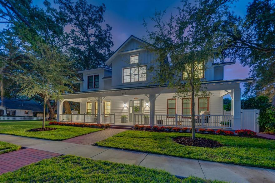 A truly masterful achievement of concept and design, this stunning designer ready custom 8,245 sqft residence built by Monogram builders showcases exquisite craftsmanship "3-miles of custom shiplap", classic elegance & cutting edge design. Meticulously maintained and landscaped - AstroTurf hardscaped backyard - this 13,774 sqft corner lot is located on one of Dunedin's brick streets - walkable to the downtown core of the community. Step into Timeless Elegance: 28' foot grand entry, engineered white oak wide plank hardwood floors, 20-foot 1/2 face brick natural gas fireplace, 7" baseboard molding & custom window treatments. The parlor offers peaceful solace from any busy day: board & batten, v-groove ceiling & chandelier. The great room, illuminated by natural light, features a "smart home" whole home interior & exterior audio powered by Savant, commercial-grade WiFi system, state-of-the-art security system fully extendible, built-in cabinets & mounted TV. Culinary kitchen: quartz top center island with farm sink, 3-pendant lights, Fishel & Paykel dishwasher, warming drawer, 3-pendant lights, 6-burner gas range, 2x ovens, range hood, brick backsplash, barn door walk-in pantry. French doors open to the family sunroom overlooking the private fenced backyard with pool powered by a heat pump (warm in the winters cool in the summers). This home is an entertainers delight and can easily accommodate upwards of 200 people! Butler pantry: granite top, sink, ice maker, walk-in pantry. Sumptuous first floor owner's retreat: beamed ceilings, shiplap, 2 decorator chandeliers, his/her sizeable custom master closet, desk. 8' frosted glass French doors open into the master bathroom: 2-quartz top vanities, built-in linen closets, glass door walk-in steam shower, rainfall & double shower heads, separate water closet. Access to sun porch. Laundry room. Kids game & crafts room ideal for a playroom + storage & art room. Powder room. Second floor features an in-home theater: cathedral ceilings, screen & projector, wet bar. An in home office: exposed ductwork, wet bar, ice maker & mini frig, cabinet storage, room for a pool table, TV, adjacent fitness room, both are soundproof. Each 4-bedrooms: walk-in custom closets, ceiling fans, hardwood floors, 7" baseboard molding. Side-load 3-car garage with anti-slip flooring, 7k lb car lift totaling 4-car garage extendable to a 6-car garage. Whether its by sheer happenstance or smart business design, Dunedin located on the Intracoastal Waterway of the Gulf of Mexico has succeeded in maintaining its small-town charm while putting out the welcome mat for visitors. Its walkable Main Street has unique restaurants, interspersed with boutiques and an abundance of craft breweries. Minutes to the Tampa International Airport rated No. 1 and the Gulf Beaches.