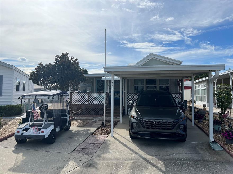 Look no further! Check out this cozy home in a 55 and older community. You own the land.  This home has been well taken care of. Nicely located close to rt27. Low HOA and low taxes. enjoy a nice relaxing evening on your covered front porch. Bonus room can be used as a 2nd bedroom. No rear neighbors. Metal roof with lifetime warranty. Heated community pool is located next to the community clubhouse. This community has many activites and events weekly. Covered parking for those rainy Florida summer days. There is also a parking spot for your golf cart. nicely paved yard help with easy maintainence. there is a large storage shed in the back yard. Washer and dryer are conviently located inside the home. Don't miss this one!