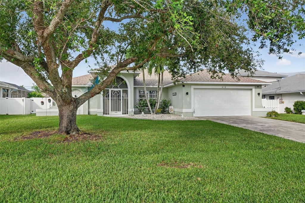 Photo of 412 SE 13th Avenue, Cape Coral, FL 33990 (MLS # C7522856)