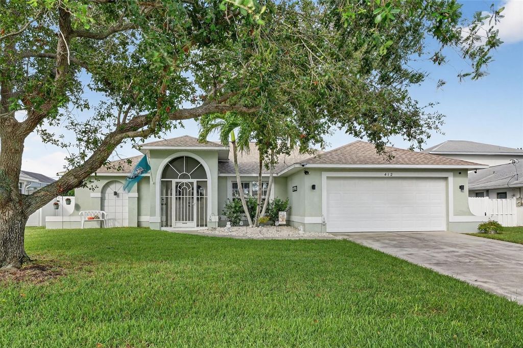 Photo of 412 SE 13th Avenue, Cape Coral, FL 33990 (MLS # C7522856)