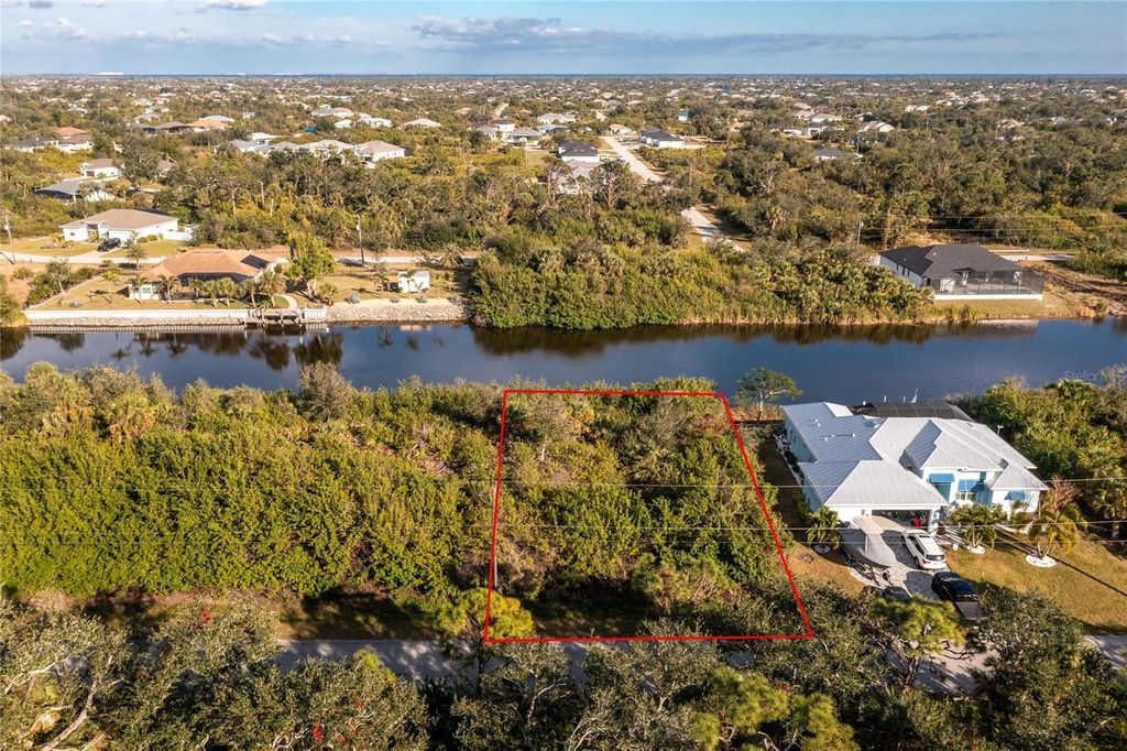 Photo of 10168 Cocoa Beach Street, Port Charlotte, FL 33981 (MLS # D6135129)