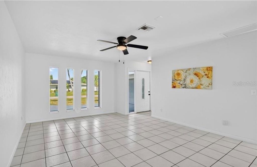 Photo of 918 SE 35th Street, Cape Coral, FL 33904 (MLS # C7525879)
