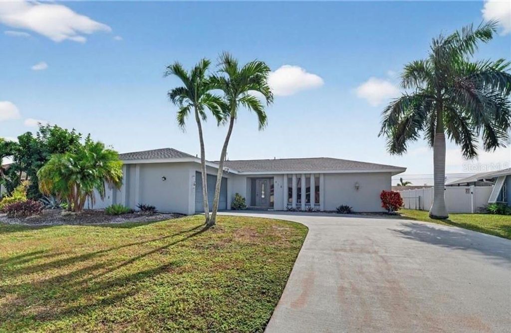 Photo of 918 SE 35th Street, Cape Coral, FL 33904 (MLS # C7525879)