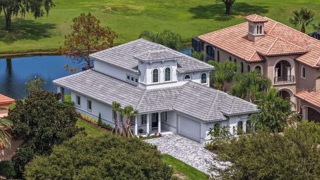 Photo of 612 Mahogany Run, Palm Coast, FL 32137 (MLS # FC321194)