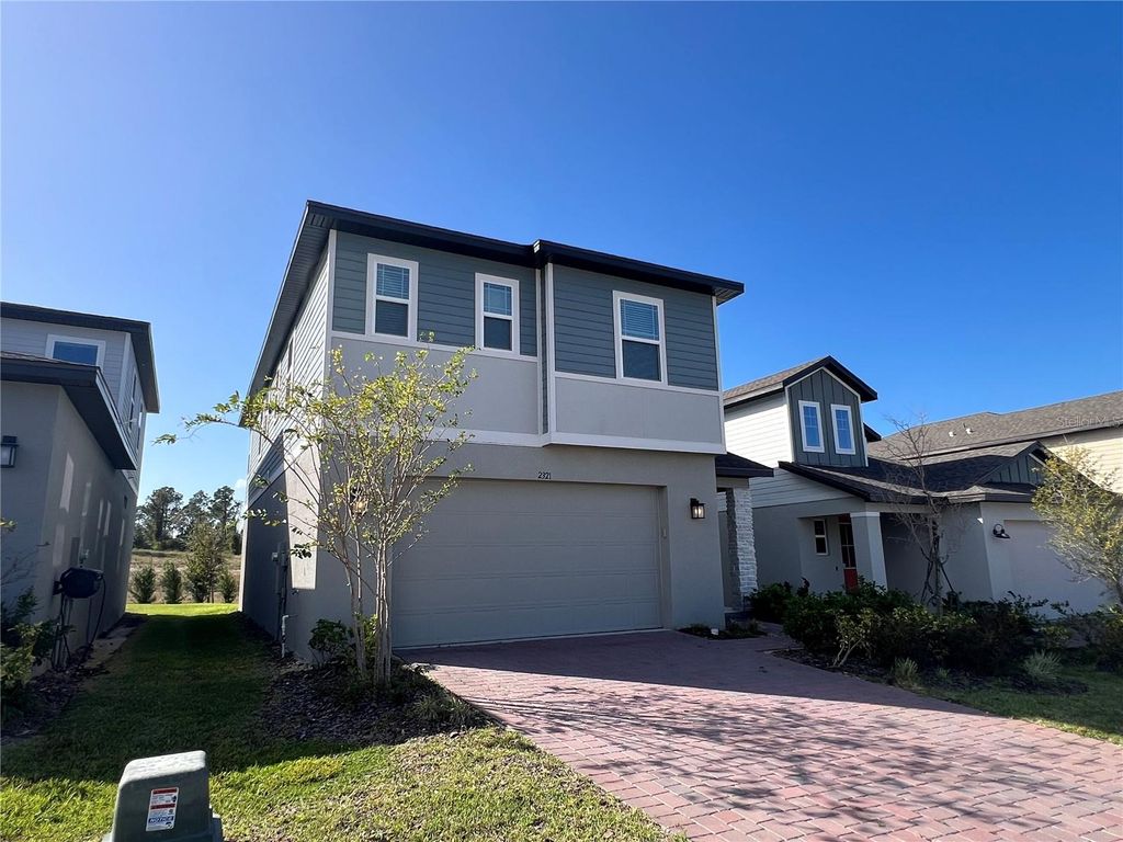Photo of 2321 Mystic Maze Lane, Minneola, FL 34715 (MLS # O6395793)
