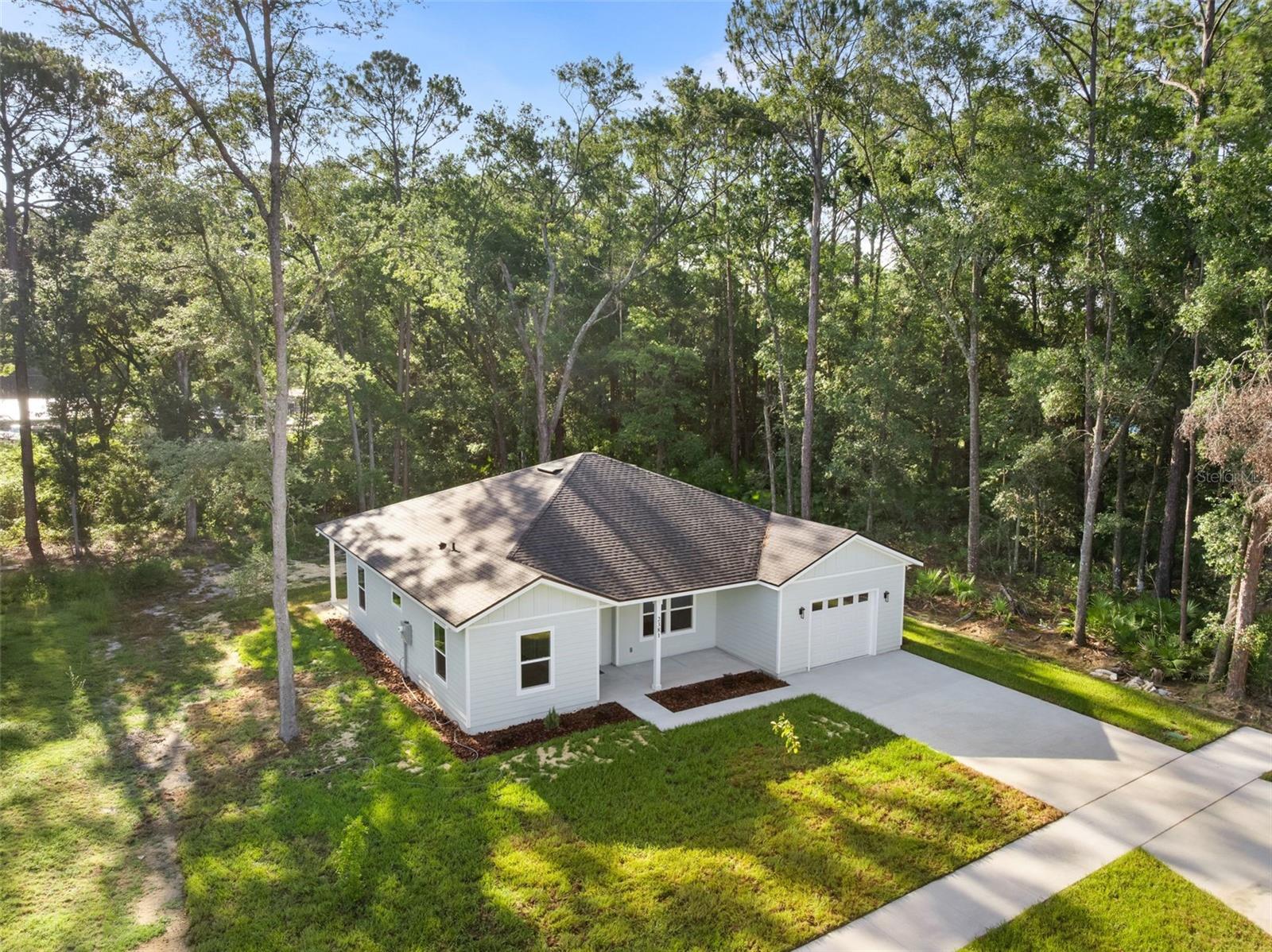Experience the charm of new construction in Gainesville! This stunning three-bedroom, two-bath home represents the essence of pride in homeownership. Nestled on nearly a quarter of an acre, you’ll love the inviting covered porches at both the front and back, perfect for sipping sweet tea while basking in the tranquility of your private retreat.
Step inside to an open floor plan that welcomes you with elegant stone countertops and a magnificent island — an entertainer's dream! The thoughtful split layout ensures your privacy while guests enjoy their own space. Picture yourself enjoying cozy breakfasts in your quaint nook at the rear of the house.
Unwind in the oversized shower after a long day, or whip up culinary masterpieces in your impressive kitchen. Don’t miss out on this opportunity to call this beautiful home your own. Schedule your showing today!
