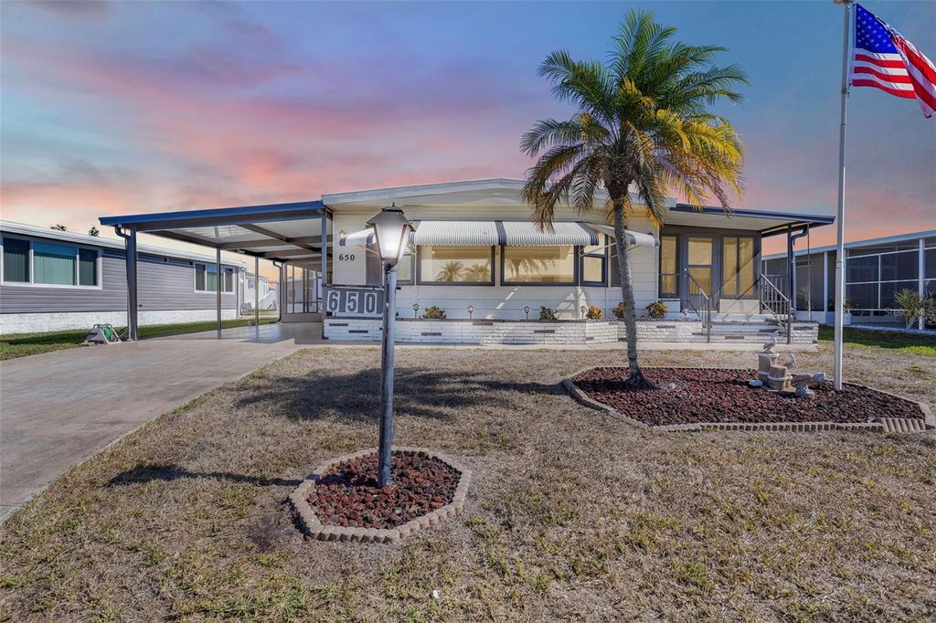 Photo of 650 La Sala, North Port, FL 34287 (MLS # TB8475419)