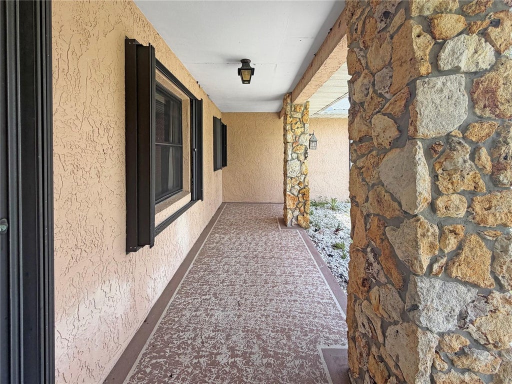 Photo of 2417 Travelers Palm Drive, Edgewater, FL 32141 (MLS # O6418971)