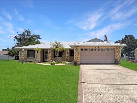 Photo of 2417 Travelers Palm Drive, Edgewater, FL 32141 (MLS # O6418971)