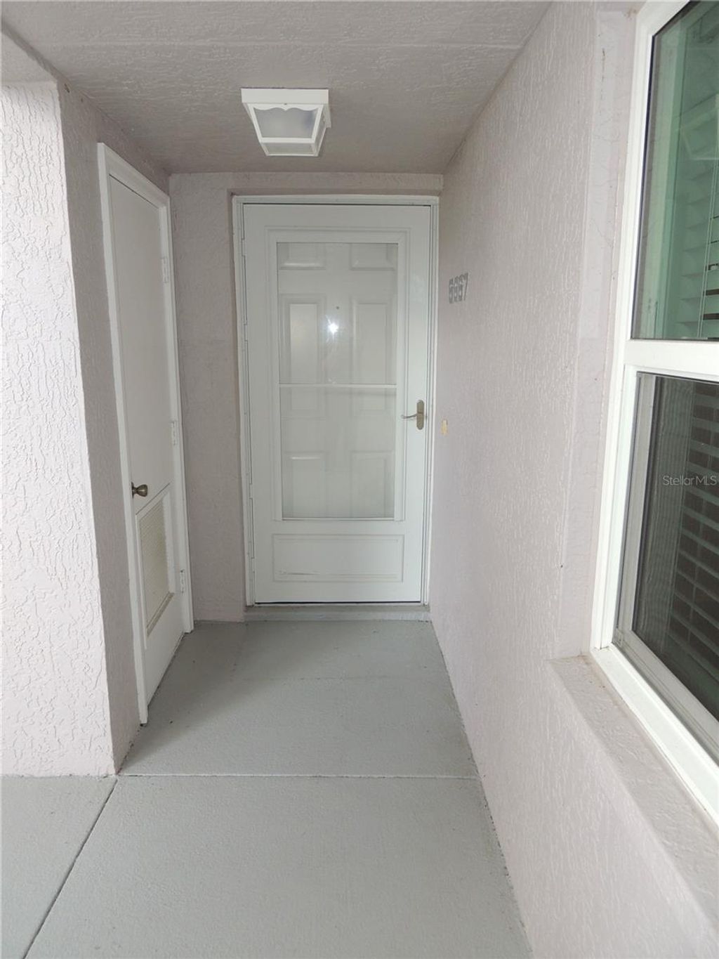 Photo of 5667 Sheffield Greene Circle #59, Sarasota, FL 34235 (MLS # A4667845)